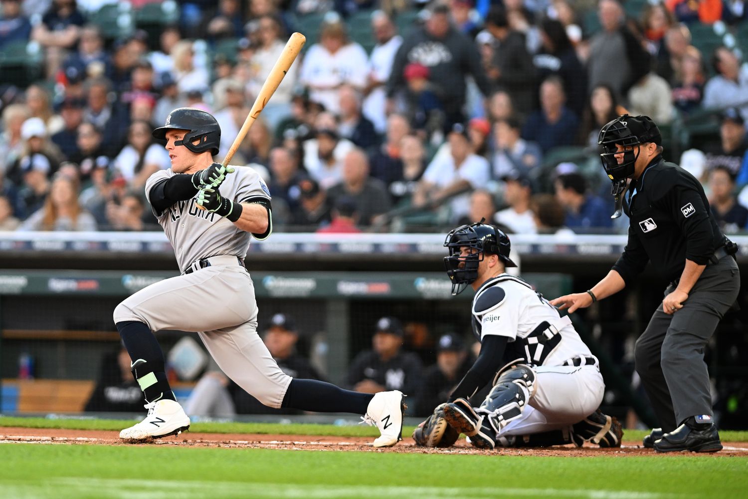 Aug 30, 2023; Detroit, Michigan, USA; New York Yankees center fielder Harrison Bader (22) hits a single against the Detroit Tigers in the first inning at Comerica Park.